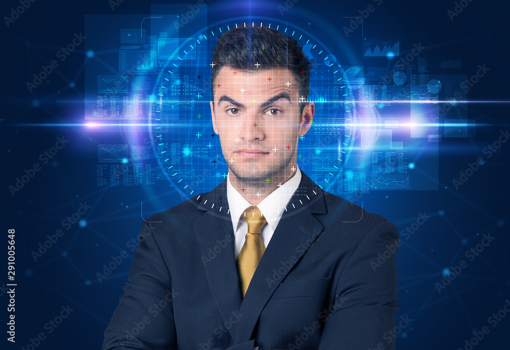 Facial recognition system. Young man on blue background Facial recognition system. Young man on blue background
