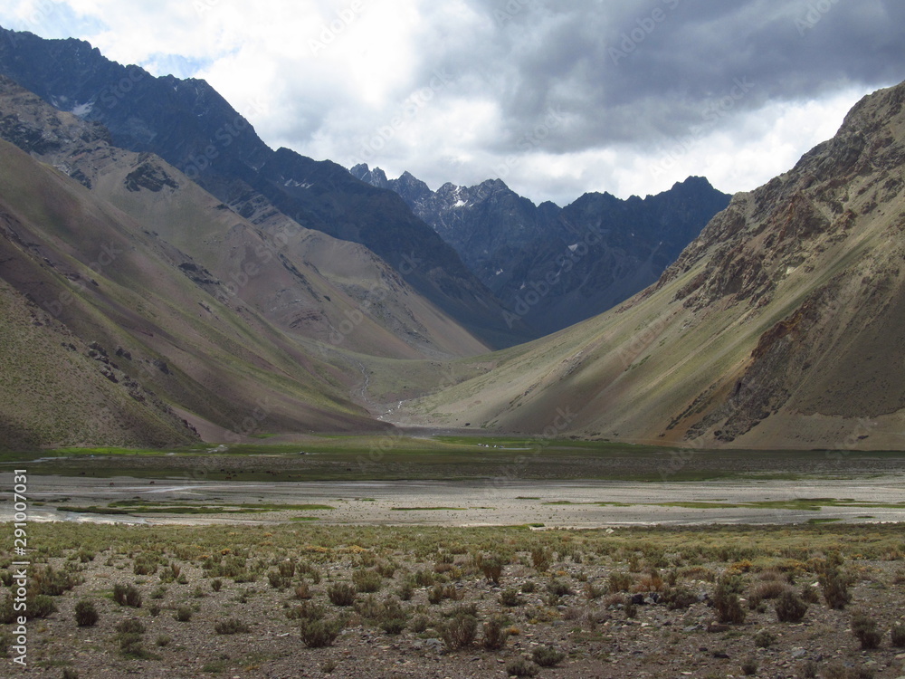 a view of mountains from El Yeso reservoir (Embalse El Yeso), in andes mountain range of Chili