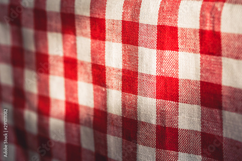 red and white tablecloth background. authentic kitchen napkin.