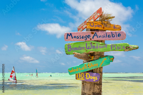 Colorful signpost at coast of Bonaire photo