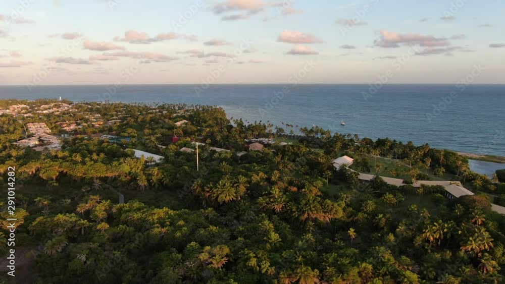Aerial view of Praia Do Forte coastline during sunset, Bahia, Brazil. Travel tropical destination. Aerial view of Praia Do Forte coastline during sunset, Bahia, Brazil. Travel tropical destination.
