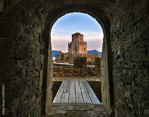 Wallpaper Mural Entrance to wooden bridge and impressive three-tiered fortified watchtower. Venetian fort castle of Methoni, Peloponnese,  Greece. Torontodigital.ca