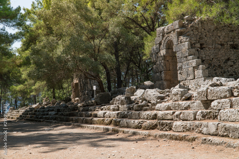 Ruins of a central ancient street in Phaselis ancient city in in Kemer region, Turkey.