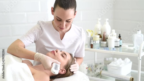 Ultrasonic scrabbing. Beautiful woman receiving ultrasound cavitation facial peeling and cleansing. Cosmetology and facial skin care. facial treatment, face cleaning