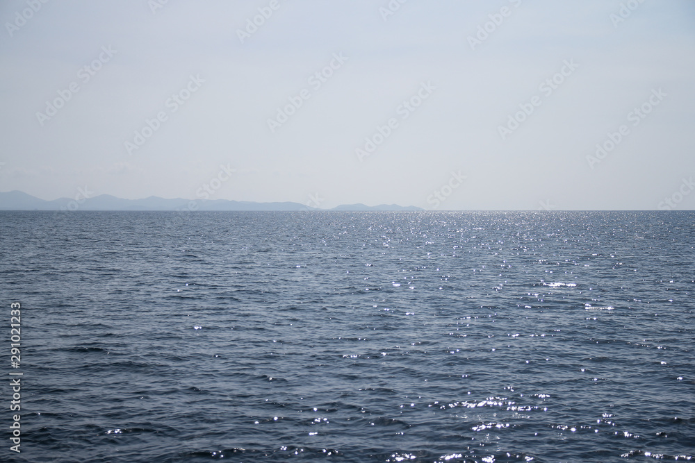 Sea wave with sky and clouds