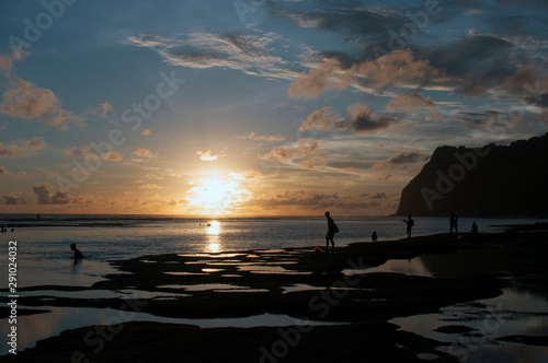 People at the Beach During Sunset photo