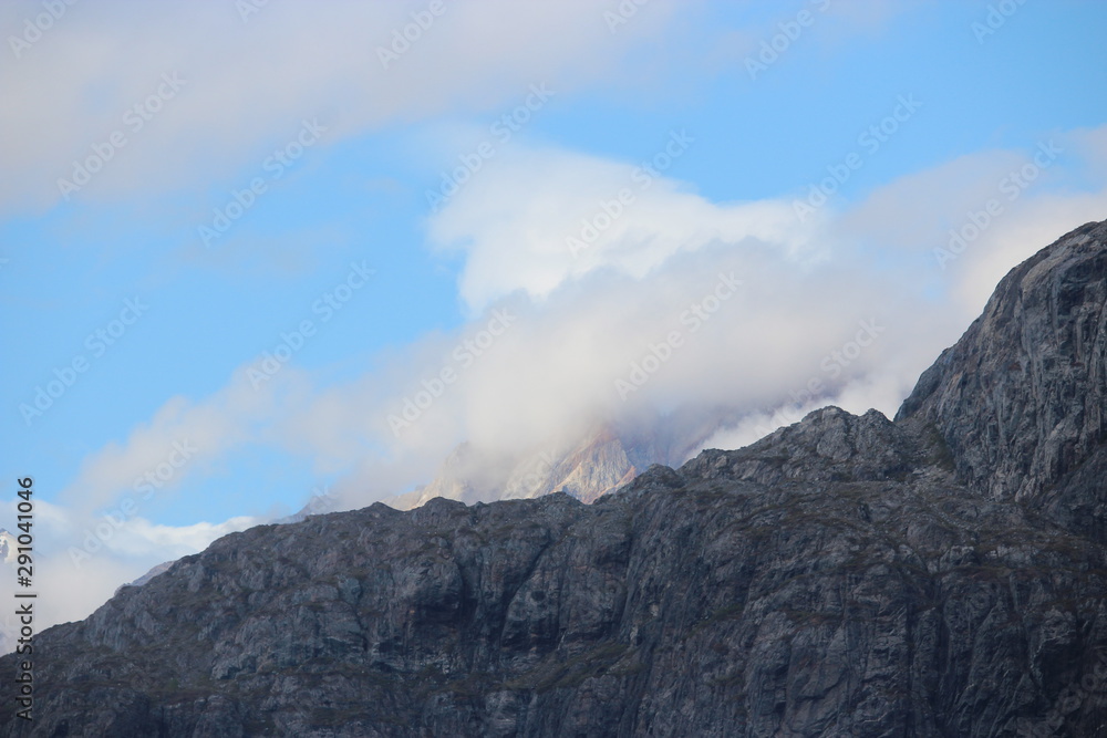 Cloud and brightness on bald mountain light; Alaska