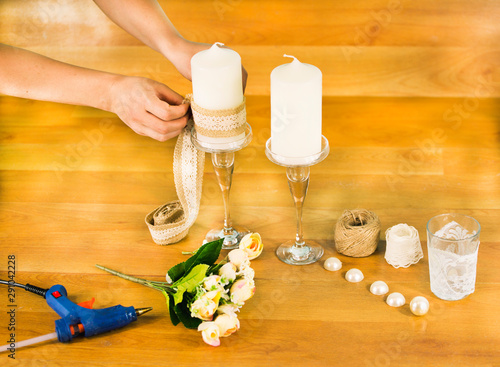 woman hand wedding candle and flower