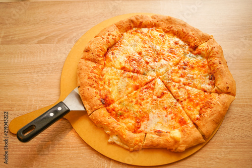 Italian pizza four cheese, home made food. Concept for a tasty meal. Close up