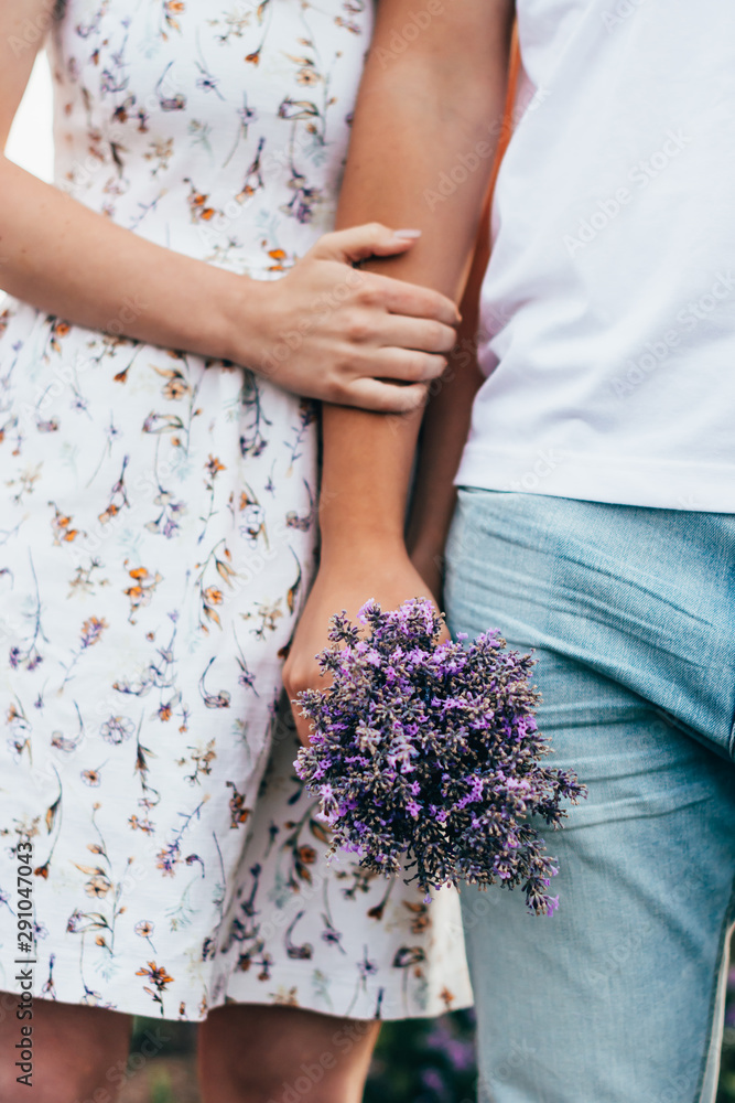 a couple with lavender flowers