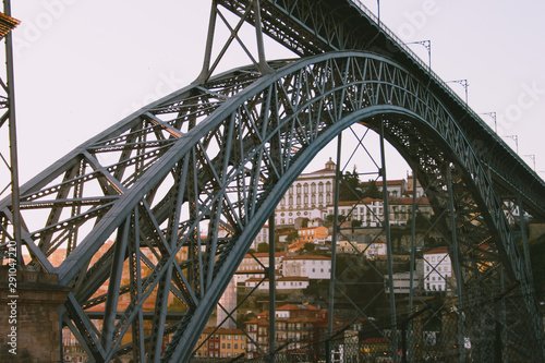 Architectural metalic bridge with panoramic view on the city © Lara