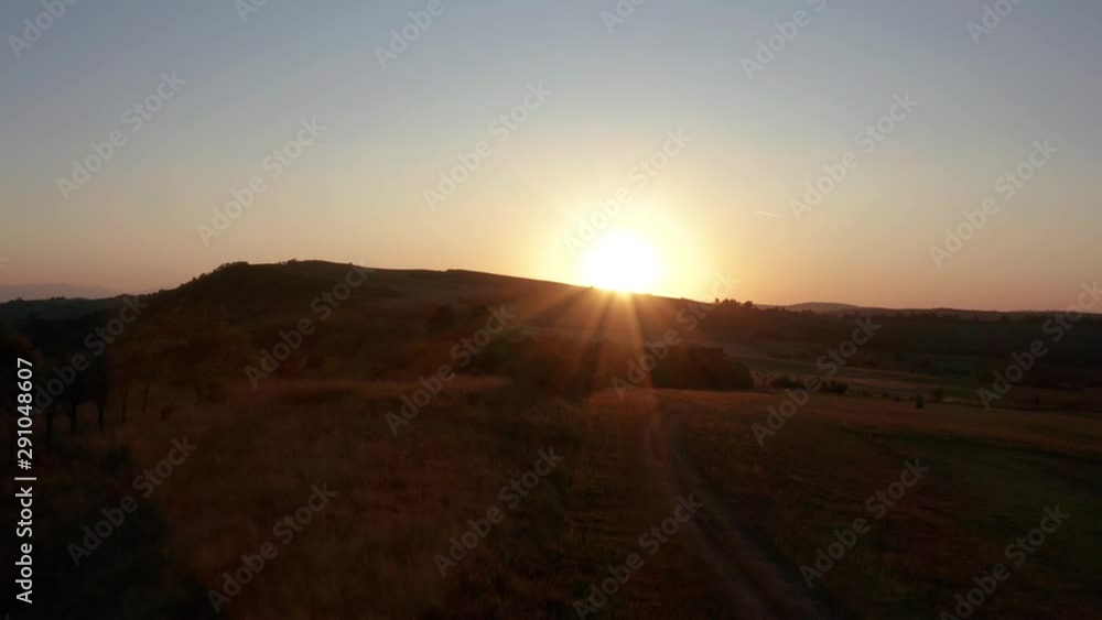 Aerial Drone Shot: Flying Over Field At Sunset Aerial Drone Shot: Flying Over Field At Sunset