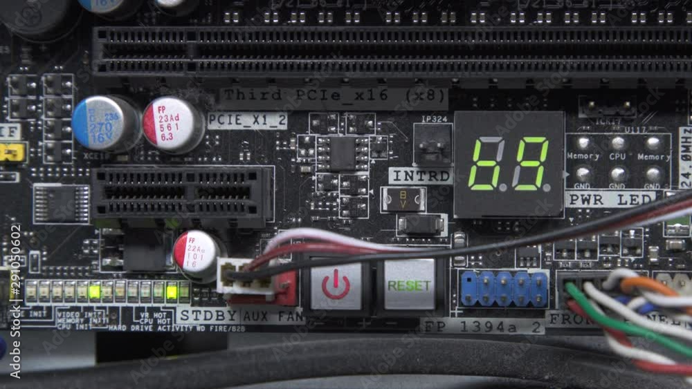 Start up and Begin work hardware Computer PC. close up to Motherboard 2 Digit BIOS POST codes in hex during boot. Start up and Begin work hardware Computer PC. close up to Motherboard 2 Digit BIOS POST codes in hex during boot.
