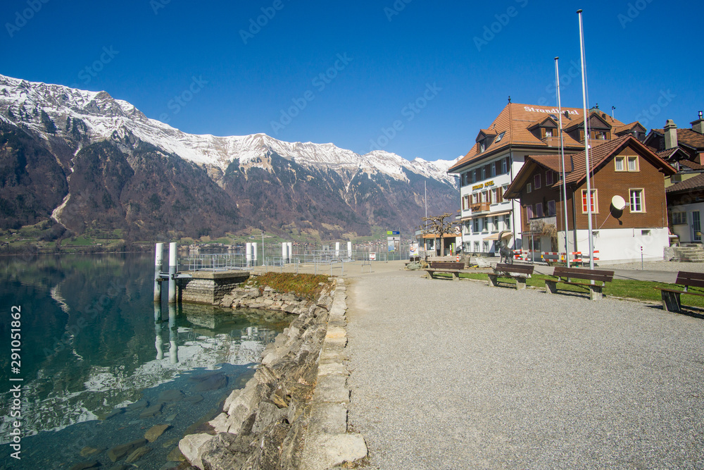 The stunning Iseltwald village  that located on the Lake Brienz this lake has a crystal clear water and surrounded by the snowy swiss alps. 