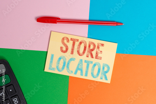 Writing note showing Store Locator. Business concept for to know the address contact number and operating hours Office appliance square desk study supplies paper sticker