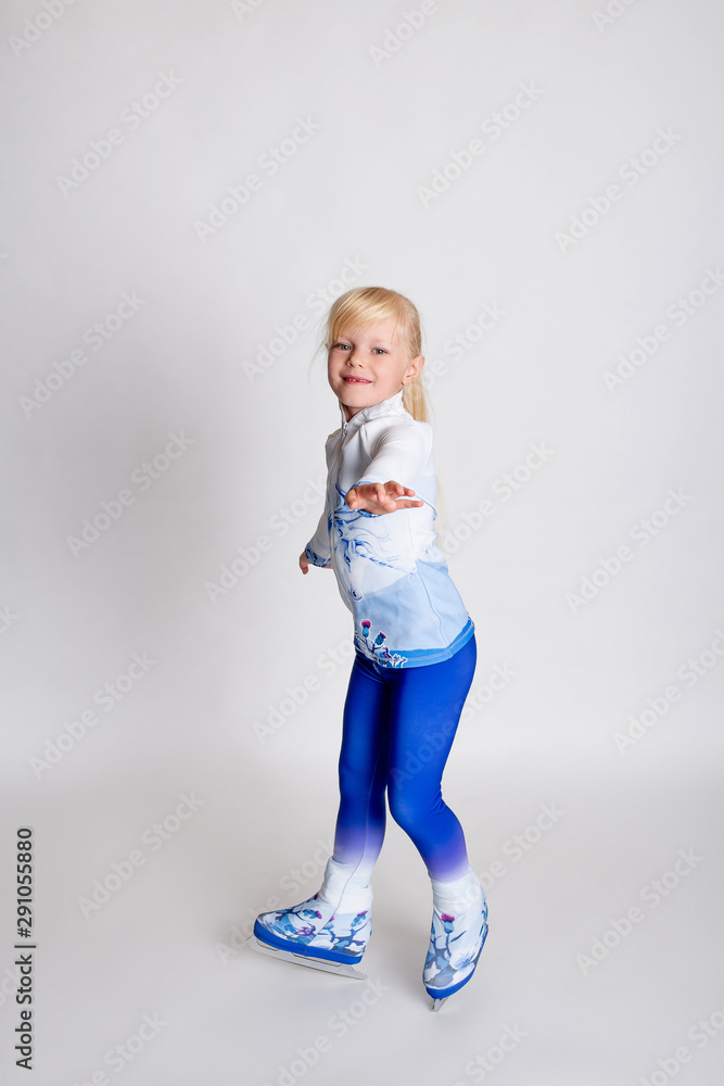 Little girl with skates isolated on background Little girl with skates isolated on background