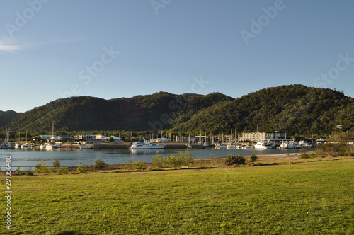 Island view with boats moored in Magnetic Island Marina from the breakwater, late afternoon. Nelly Bay, Magnetic Island, Australia © Josie Elias