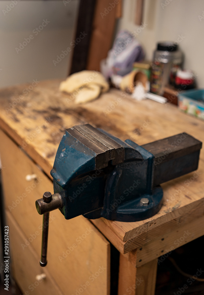 Blue Metal Vise fixed to a work table Blue Metal Vise fixed to a work table