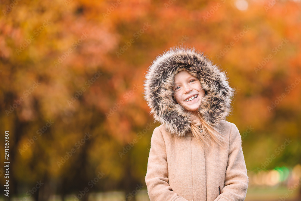 Adorable little girl at beautiful autumn day outdoors Adorable little girl at beautiful autumn day outdoors