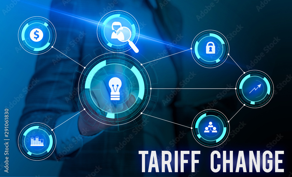 Conceptual hand writing showing Tariff Change. Concept meaning Amendment of Import Export taxes for goods and services Woman wear work suit presenting presentation smart device Conceptual hand writing showing Tariff Change. Concept meaning Amendment of Import Export taxes for goods and services Woman wear work suit presenting presentation smart device