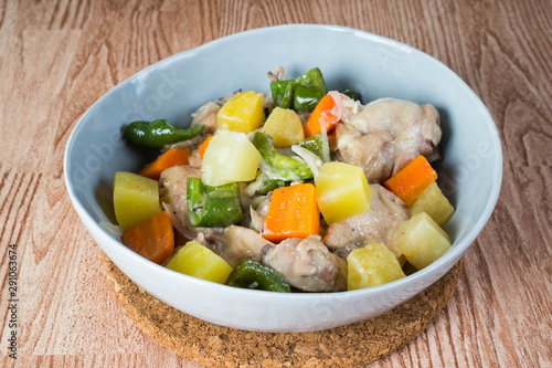 chicken pineapple coconut stew with green bell pepper and carrots