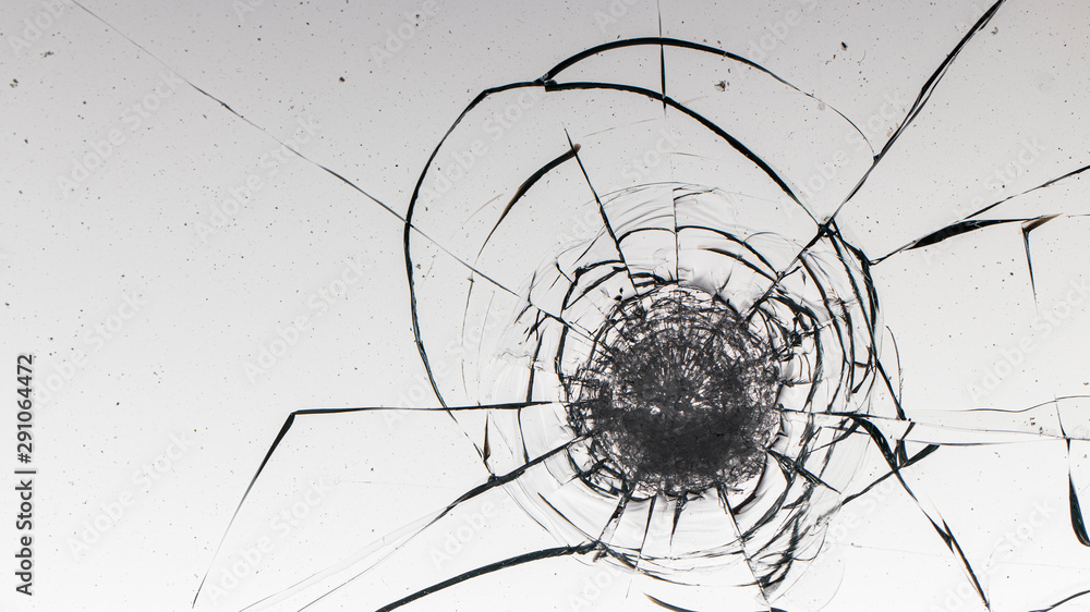 Cracked glass on a white background texture Cracked glass on a white background texture