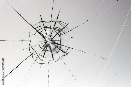 Cracked glass on a white background texture