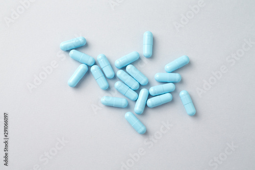 Calcium capsules. Bright background. Top view. Close up. Copy space. 