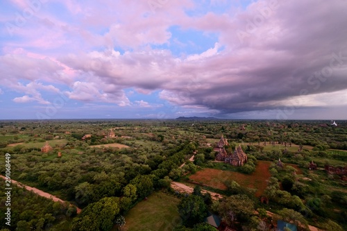 aerial view of sunset of Bagan Myanmar. Ancient pagoda in wide landscape. Dramatic clouds skyline