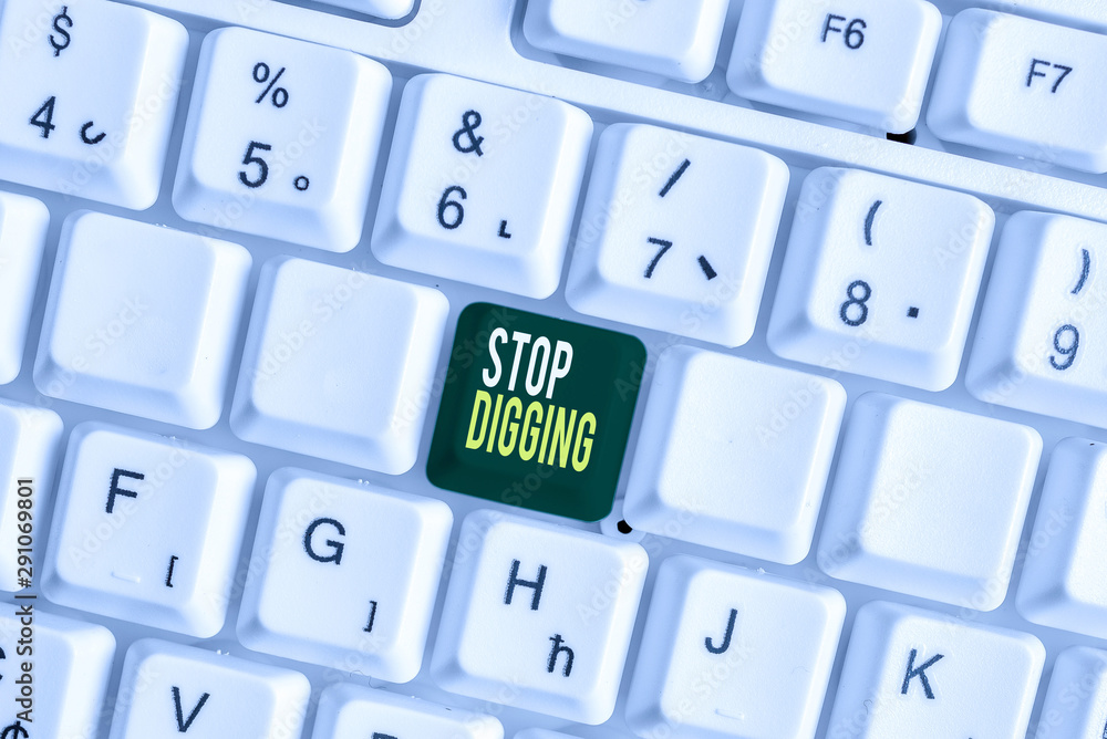 Handwriting text Stop Digging. Conceptual photo Prevent Illegal excavation quarry Environment Conservation White pc keyboard with empty note paper above white background key copy space Handwriting text Stop Digging. Conceptual photo Prevent Illegal excavation quarry Environment Conservation White pc keyboard with empty note paper above white background key copy space