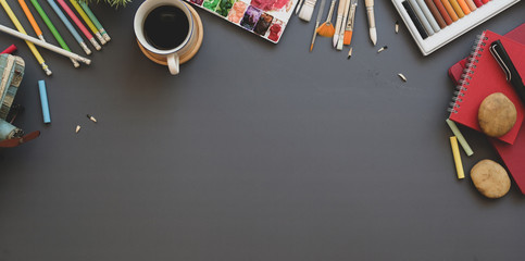 Trendy artist creative studio with copy space and painting tools and drawing equipment