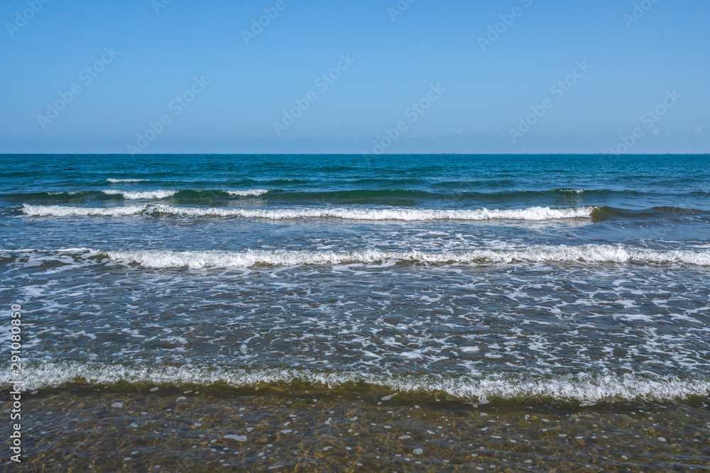 Sea shore with small waves
