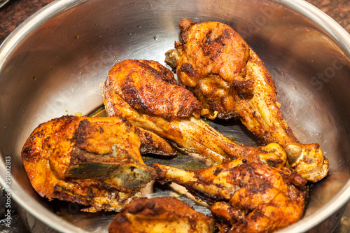Closeup of Indian style Fried Chicken in steel bowl