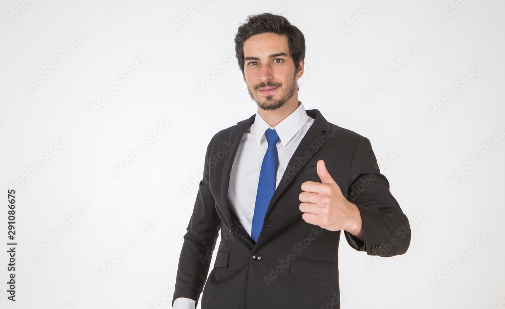 Handsome businessman wearing a suit showing thumb up or show OK or confirm white background.Business and successful concept.