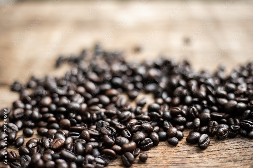 Roast coffee bean on wooden background