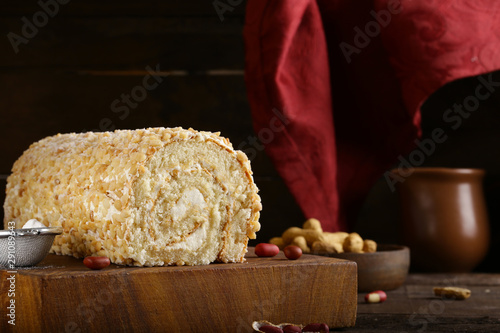 homemade biscuit roll with peanuts photo