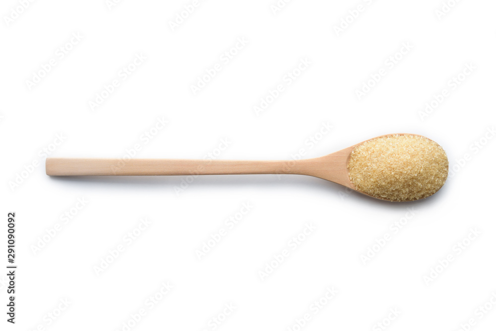 Brown sugar background with wooden spoon Brown sugar background with wooden spoon
