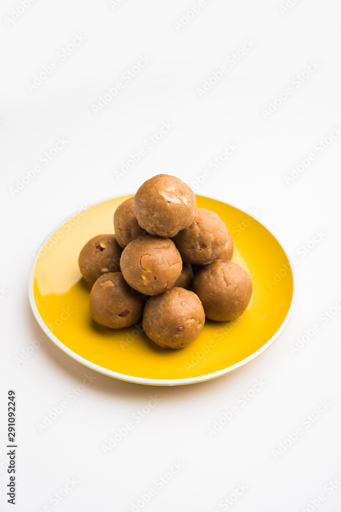 Churma Ladoo / atta laddoo / wheat flour laddu made using ghee and jaggery or sugar. selective focus Churma Ladoo / atta laddoo / wheat flour laddu made using ghee and jaggery or sugar. selective focus