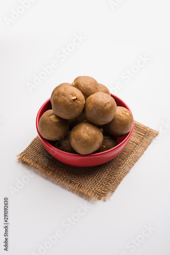 Churma Ladoo   atta laddoo   wheat flour laddu made using ghee and jaggery or sugar. selective focus