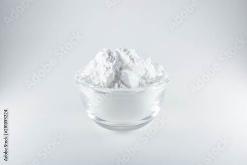 Close-up of flour or starch, Corn starch or tapioca starch powder in glass bowl background isolate