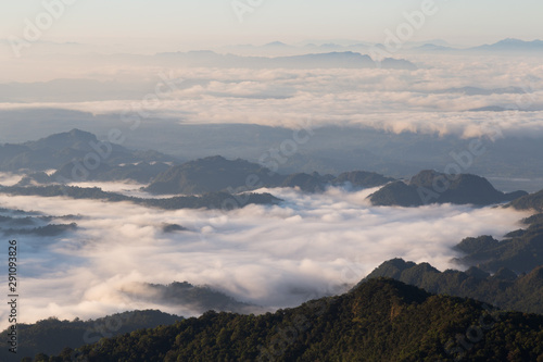 Sea of mist, fog and fluffy cloud mountain valley landscape in Thailand