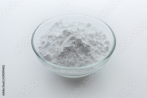Close-up of flour or starch, Corn starch or tapioca starch powder in glass bowl background isolate