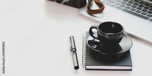 Wallpaper Mural Trendy workplace with black coffee cup and laptop computer with copy space Torontodigital.ca