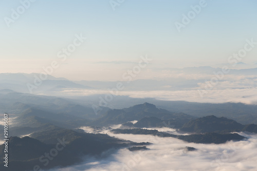 Sea of mist, fog and cloud mountain valley landscape © Pawarun