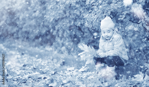 Kids walk in the park first snow