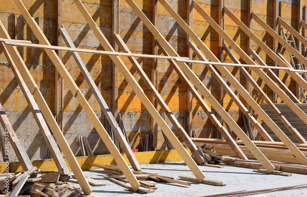 sturdy wooden supports on a construction site sturdy wooden supports on a construction site