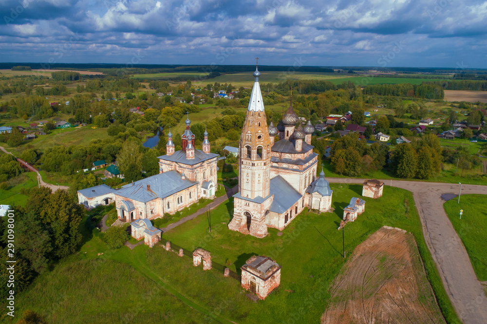View of the old temple complex in the village of Parskoye on a cloudy September day (aerial photography). Ivanovo region, Russia