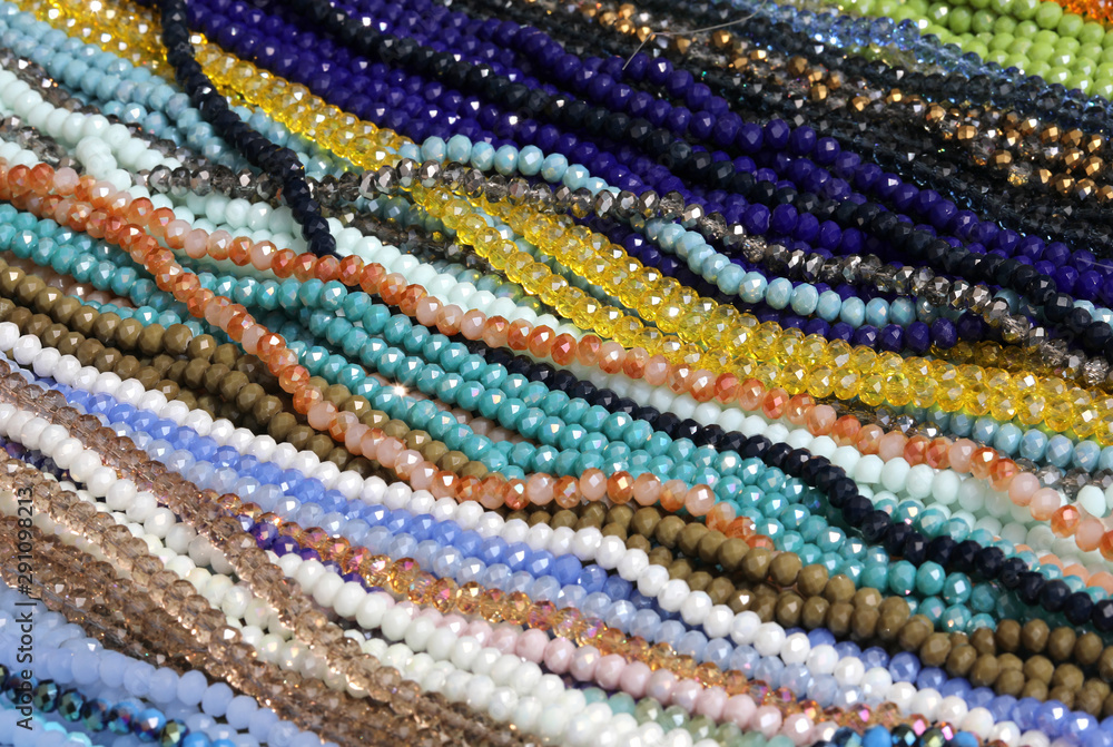 colored pearl necklaces on display in a jewelry store colored pearl necklaces on display in a jewelry store