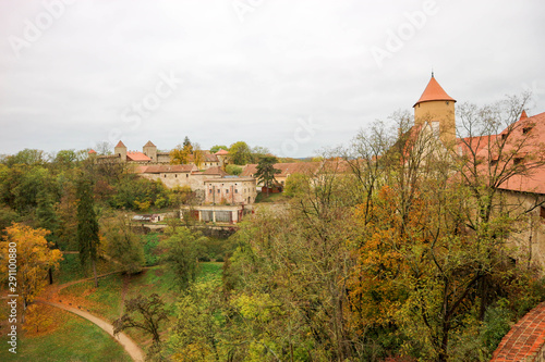 Beautiful view to old medieval Veveri castle surrounded by colorful autumn forest, Czech republic