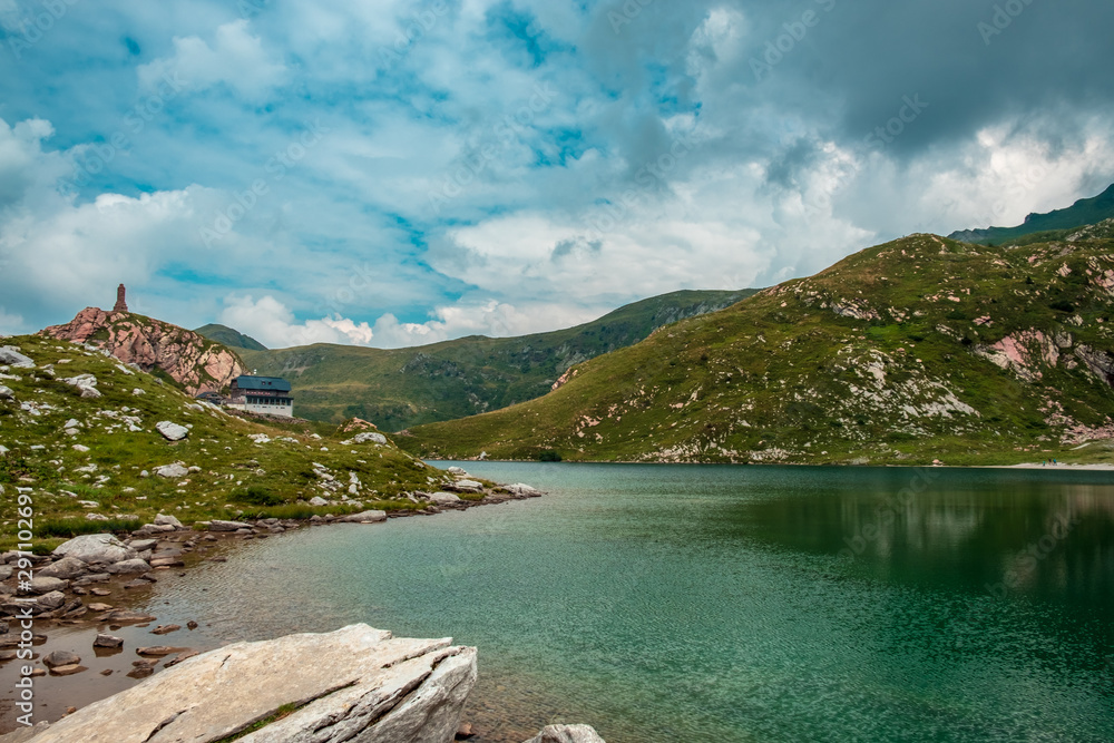 The Volaia lake in a cloudy summer day